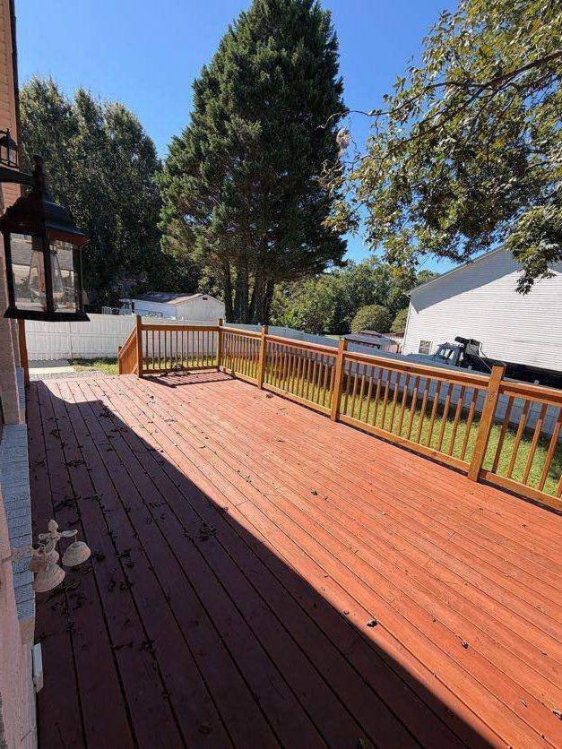 Deck looking over the fenced yard
