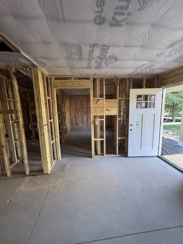 Framed interior with insulation and the front door set