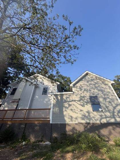 Side of the house with new siding and windows
