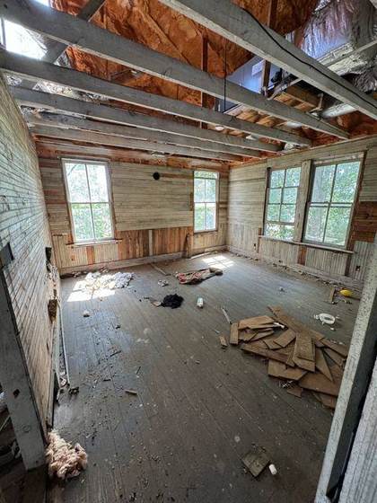 Bedroom with original beadboard, before
