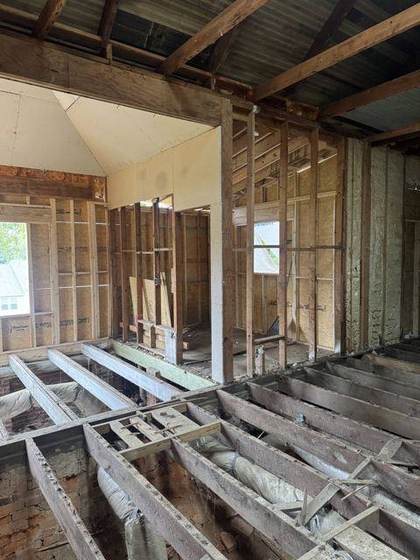 Floor joists removed in a failed section