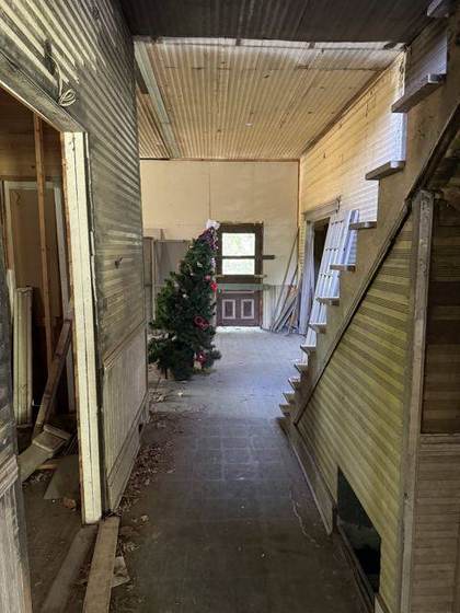 Front hall and stair as found