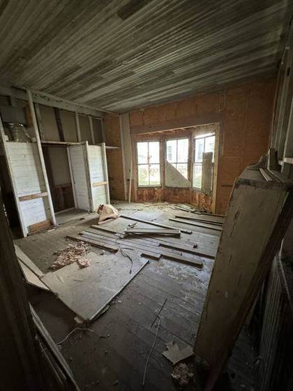 Interior stripped to the studs, before