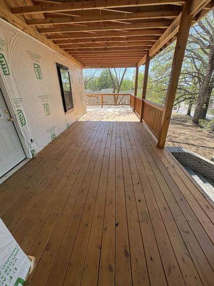 Porch deck looking along the front of the house