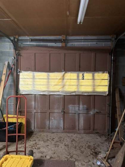 The old garage door before removal