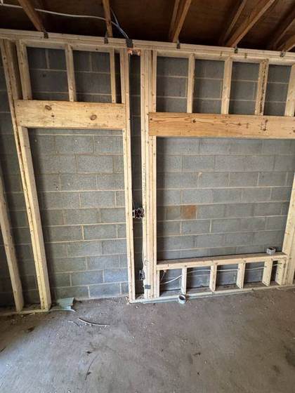 Stud walls framed inside the block