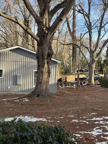 Board-and-batten siding going on