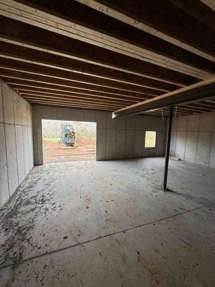 Walk-out basement with the steel beam overhead
