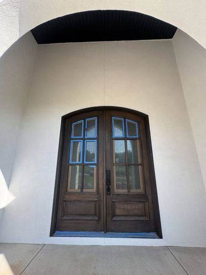 Double front door under the arch