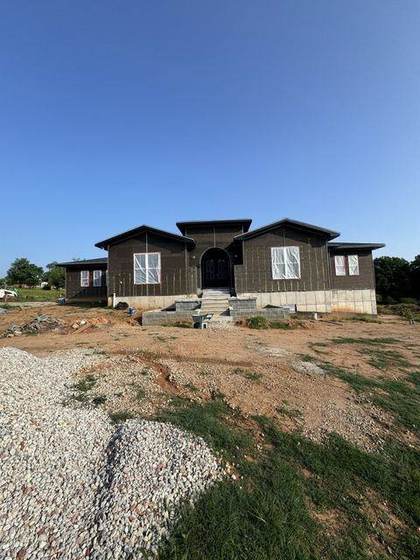 Front elevation with windows set and the weather barrier on