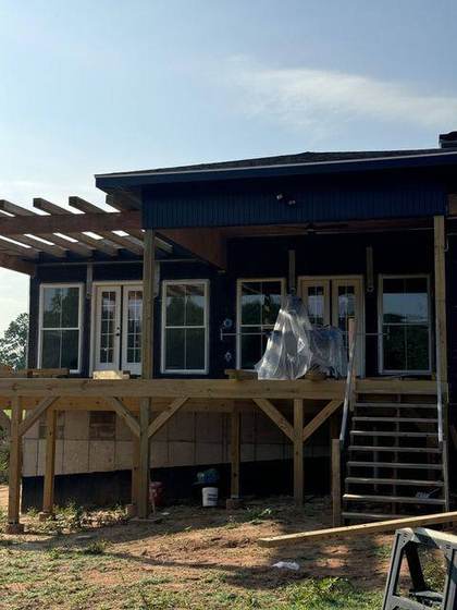Rear covered porch with doors set