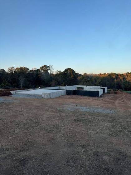 Foundation walls on the cleared lot
