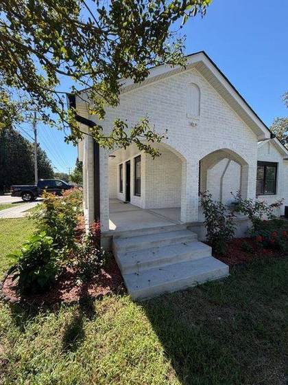 Porch arches and new windows
