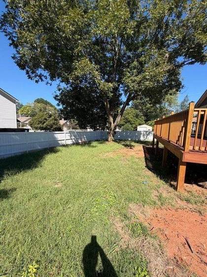 Fenced back yard and deck