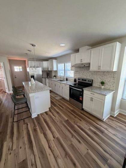 Kitchen island with granite top and seating