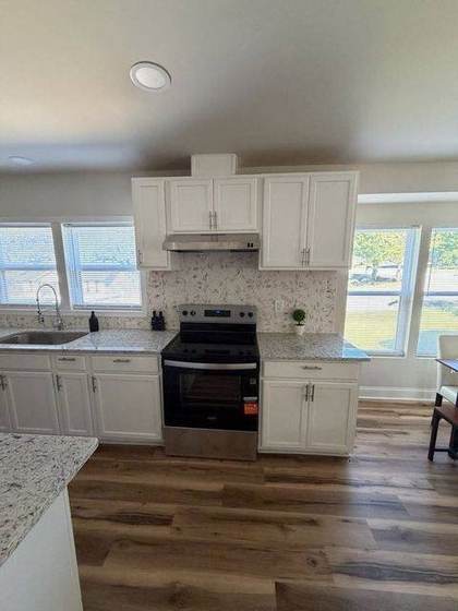 Range wall with tile backsplash