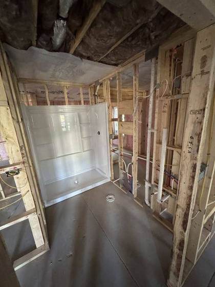 Shower unit set in the framed bathroom